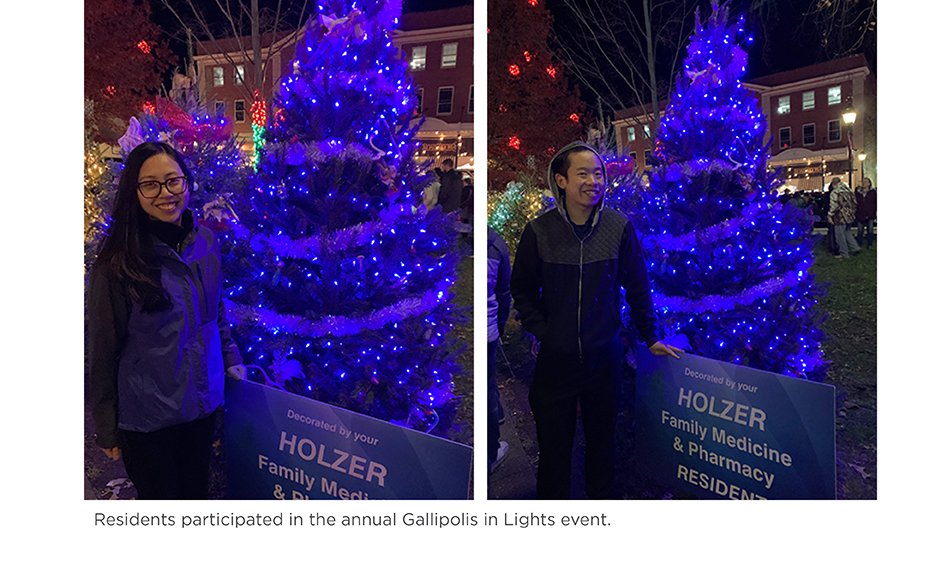 Residents pose next to decorated Christmas tree during the annual Gallipolis in Lights event.