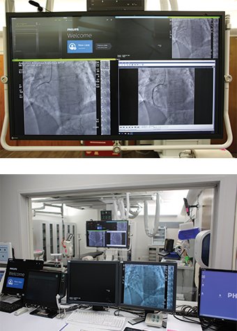 Cardiac catheterization area - top photo: close-up image of screens above cath table; bottom photo: control room area with computers and cath imagery