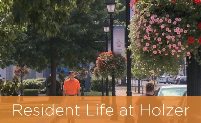 Resident Life at Holzer - person walking on sidewalk in neighborhood